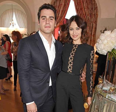 Ben posing with his current partner Olga